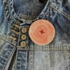 Big ass button brooch in red with red stitching